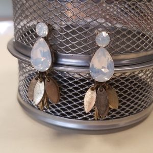 Loft gold tone post earrings with white sparkle.